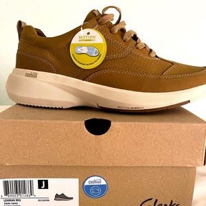 Men shoes size 10 original brand , new with the box .